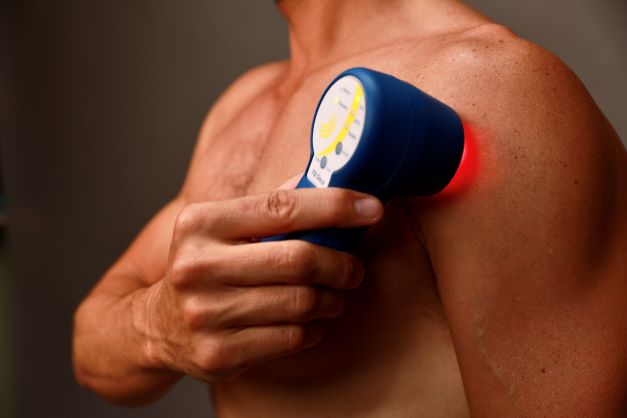 TQ Solo laser cold laser device treating shoulder